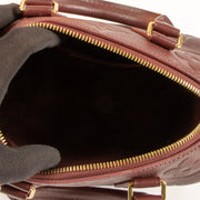 Shop the authentic Louis Vuitton Grenat Monogram Empreinte Speedy Bandoulière 20 Bag on Labellov.com !