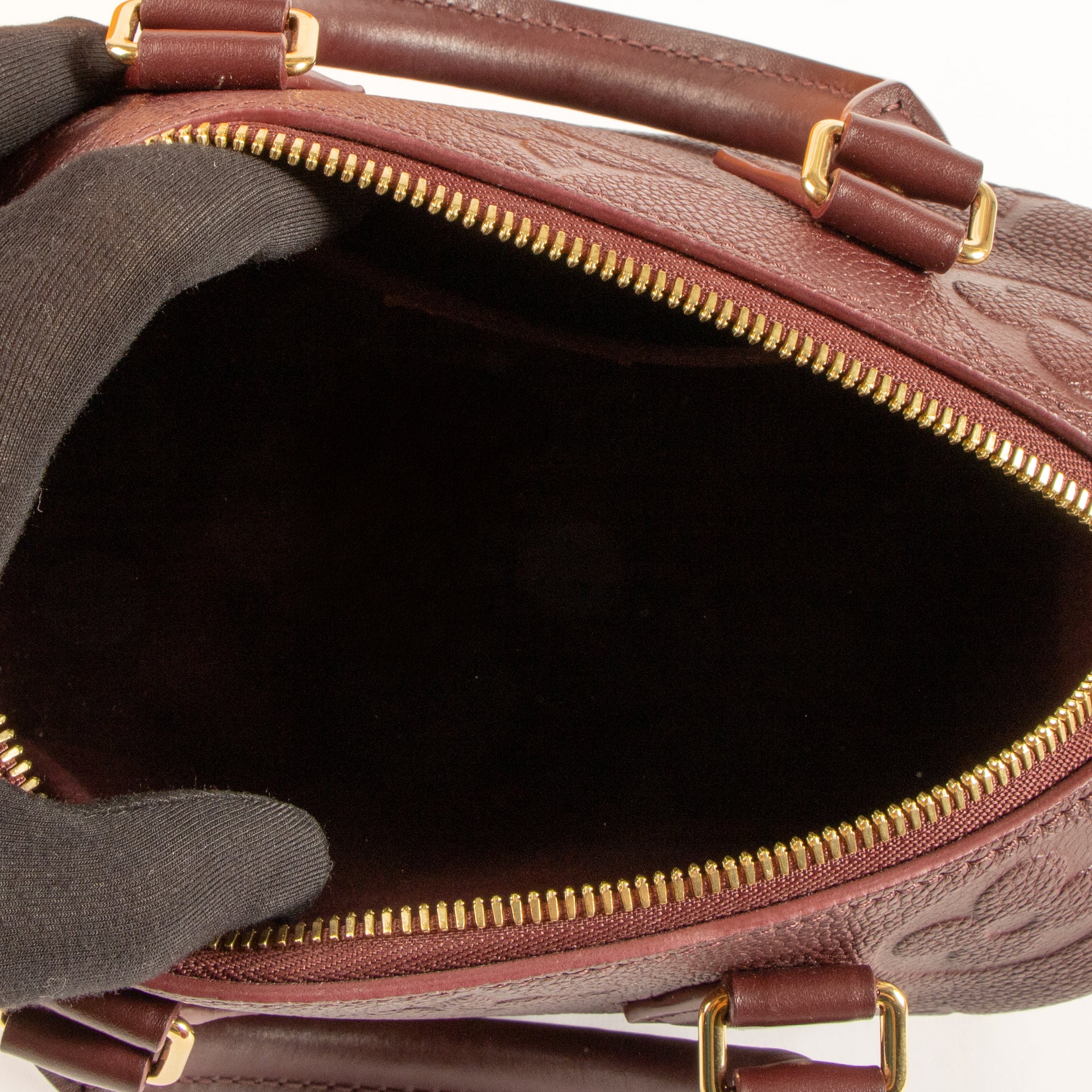 Shop the authentic Louis Vuitton Grenat Monogram Empreinte Speedy Bandoulière 20 Bag on Labellov.com !