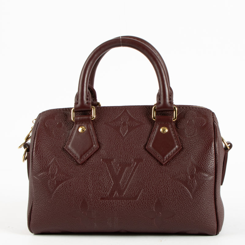 Shop the authentic Louis Vuitton Grenat Monogram Empreinte Speedy Bandoulière 20 Bag on Labellov.com !