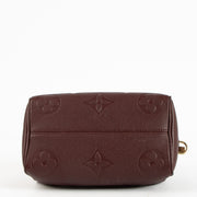 Shop the authentic Louis Vuitton Grenat Monogram Empreinte Speedy Bandoulière 20 Bag on Labellov.com !