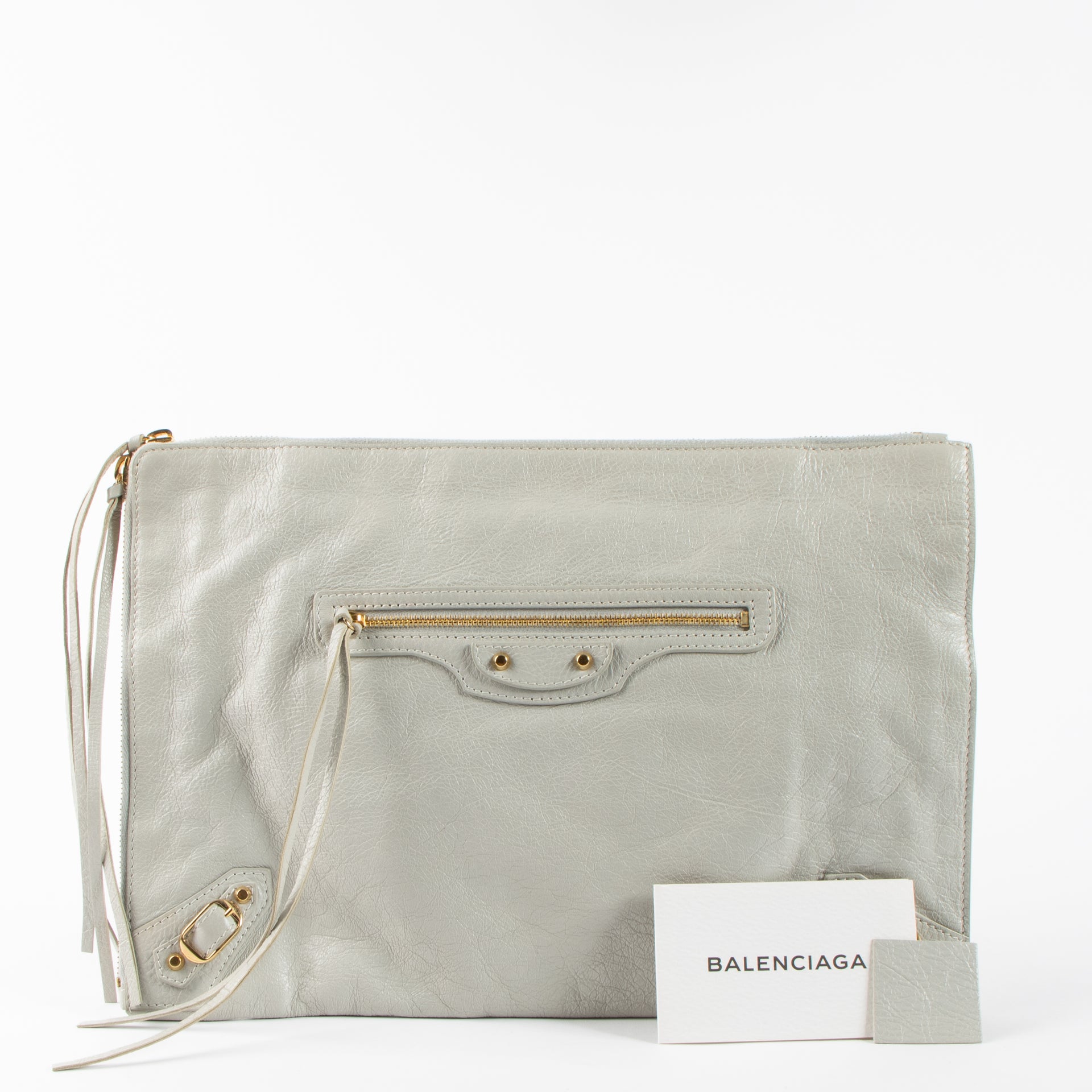 Shop the authentic Balenciaga Grey Clutch second hand on Labellov.com!