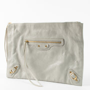 Shop the authentic Balenciaga Grey Clutch second hand on Labellov.com!