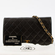 Shop this luxury authentic Chanel Vintage Black Lambskin Small Full Flap Bag Pre-Loved on Labellov.com