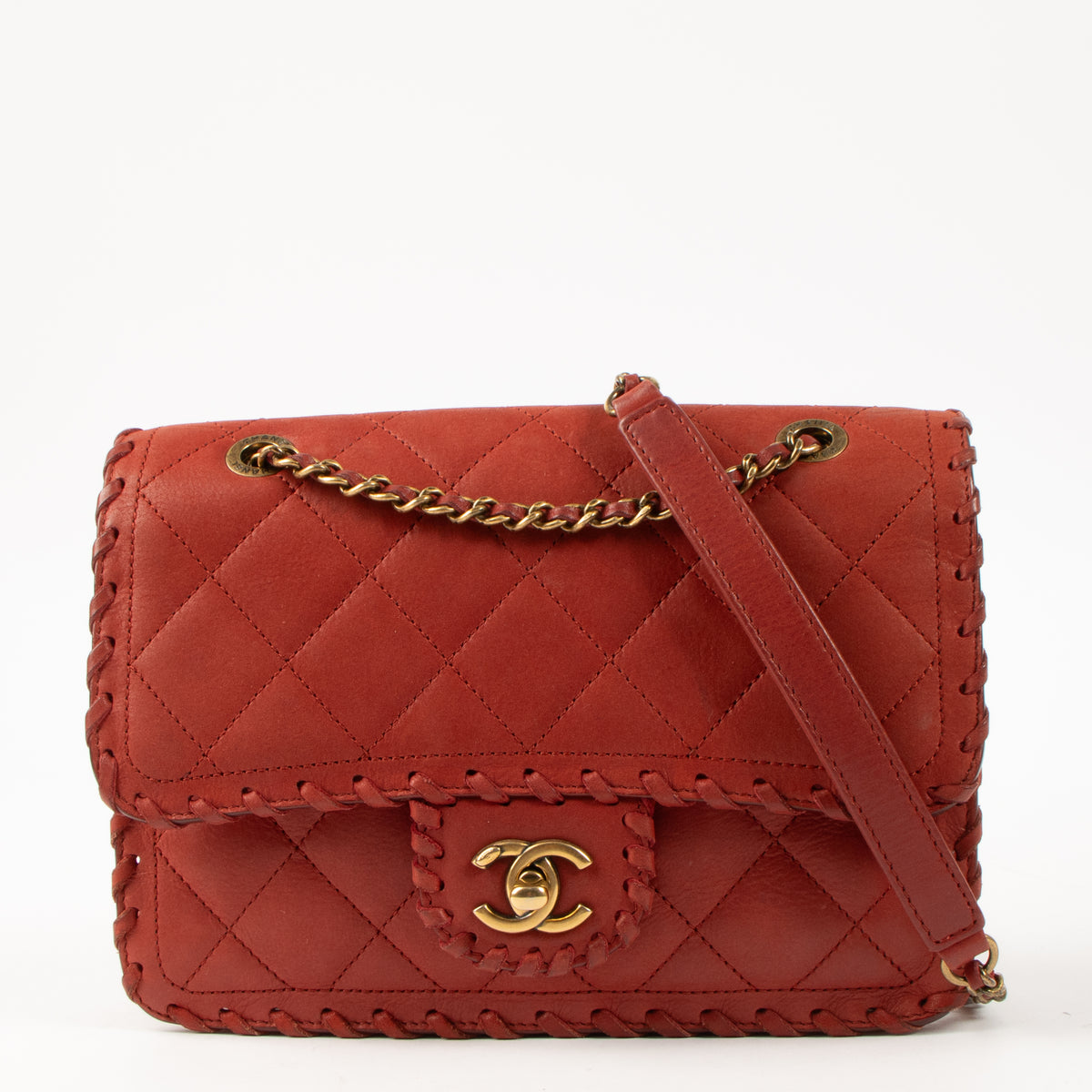 Shop this authentic Chanel red Small Quilted Iridescent Calfskin Happy Stitch Flap pre-loved on Labellov.com