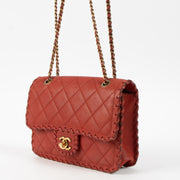 Shop this authentic Chanel red Small Quilted Iridescent Calfskin Happy Stitch Flap pre-loved on Labellov.com