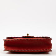 Shop this authentic Chanel red Small Quilted Iridescent Calfskin Happy Stitch Flap pre-loved on Labellov.com