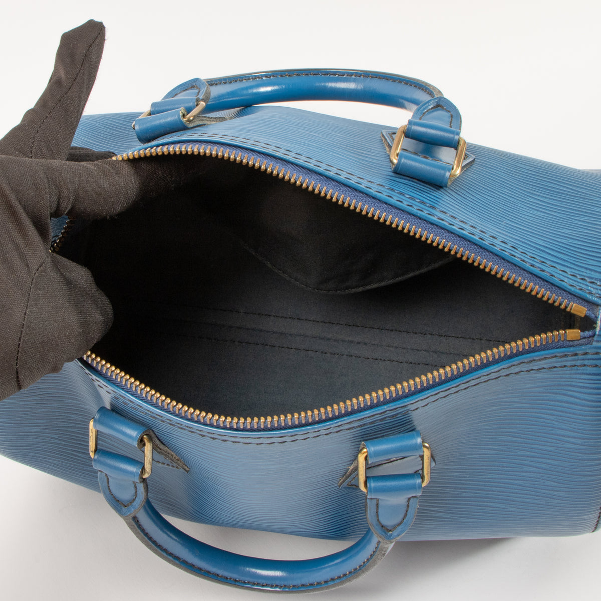 Shop this authentic Louis Vuitton Tolero Blue Epi Speedy 25 pre-loved on Labellov.com