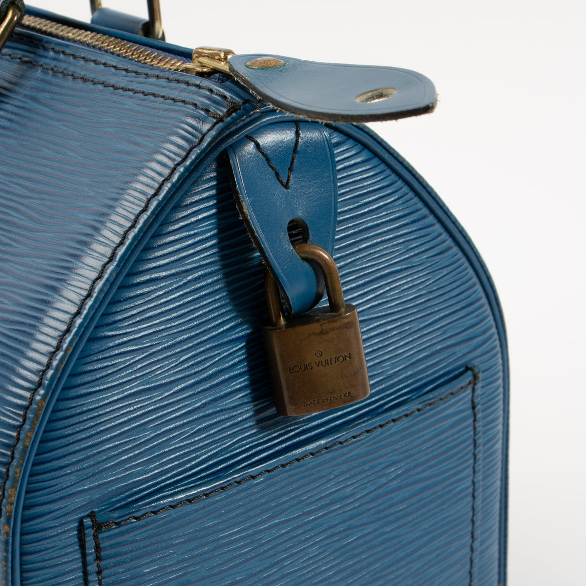 Shop this authentic Louis Vuitton Tolero Blue Epi Speedy 25 pre-loved on Labellov.com