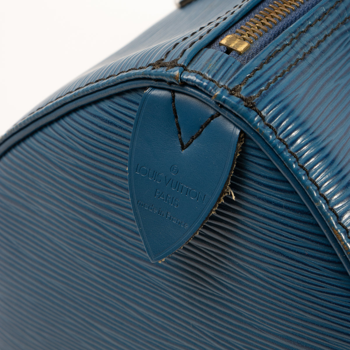 Shop this authentic Louis Vuitton Tolero Blue Epi Speedy 25 pre-loved on Labellov.com