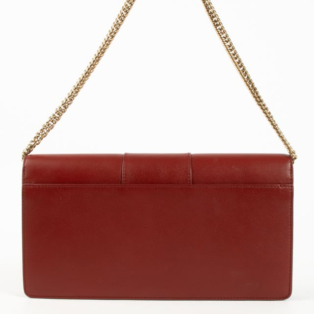 Shop the authentic Delvaux Red Presse Pochette Chain Clutch on Labellov.com!