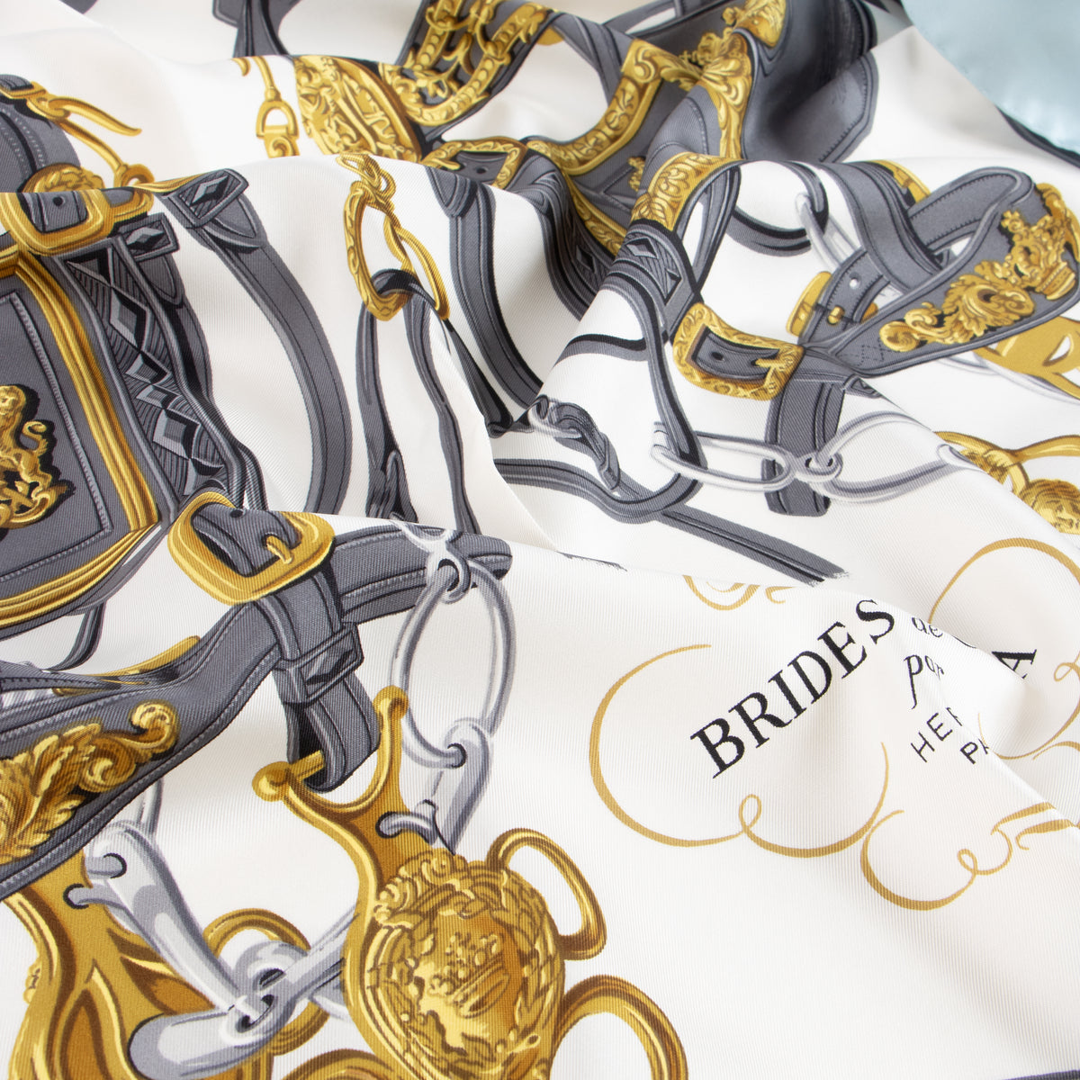 Shop the authentic Hermès Blue and White Silk Brides de Gala Carré 90 Scarf on Labellov.com.