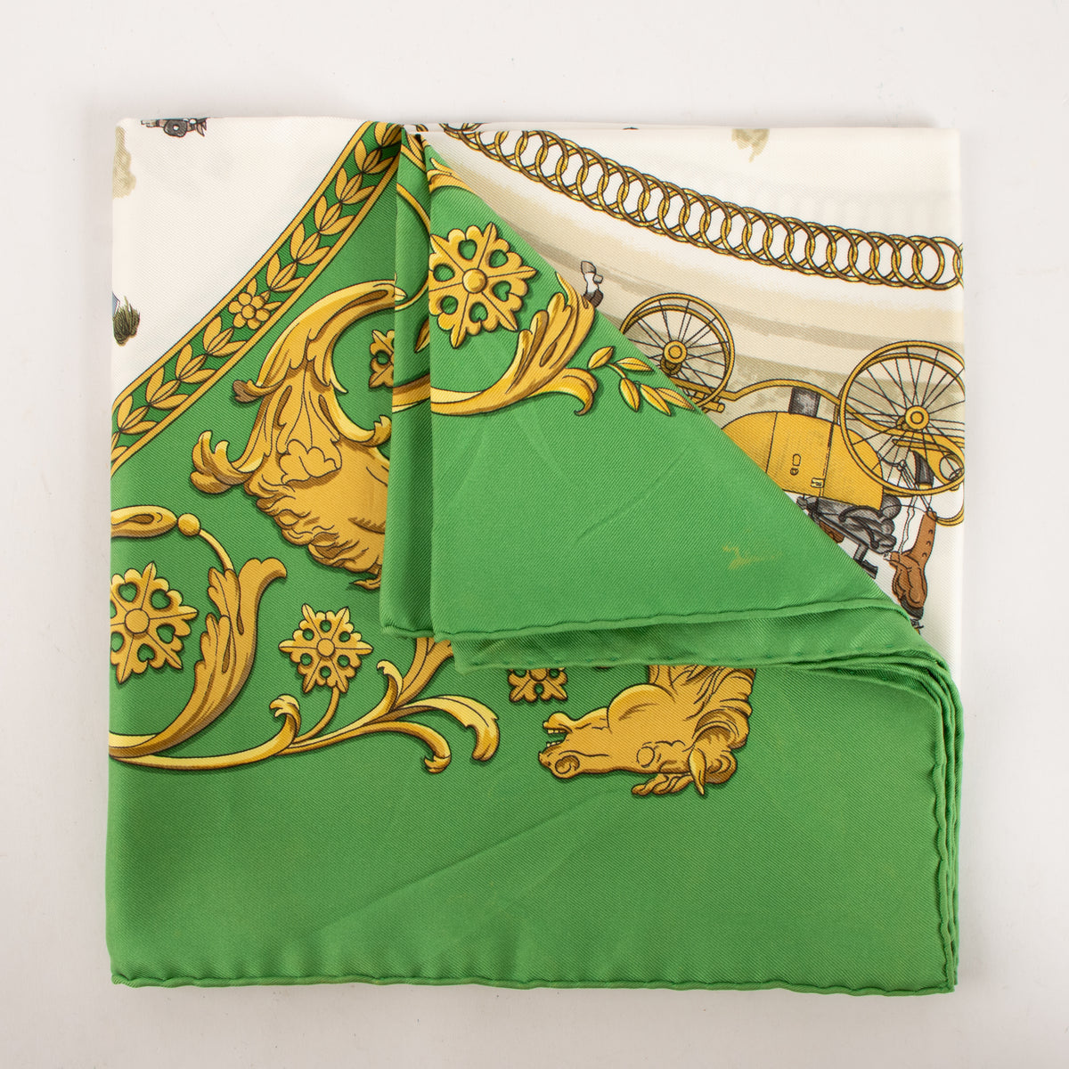 Shop this authentic Hermès Green La Promenade de Longchamps Silk Carré 90 Scarf pre-loved on labellov.com