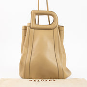Shop the authentic Delvaux Beige Punch Bag on Labellov.com !