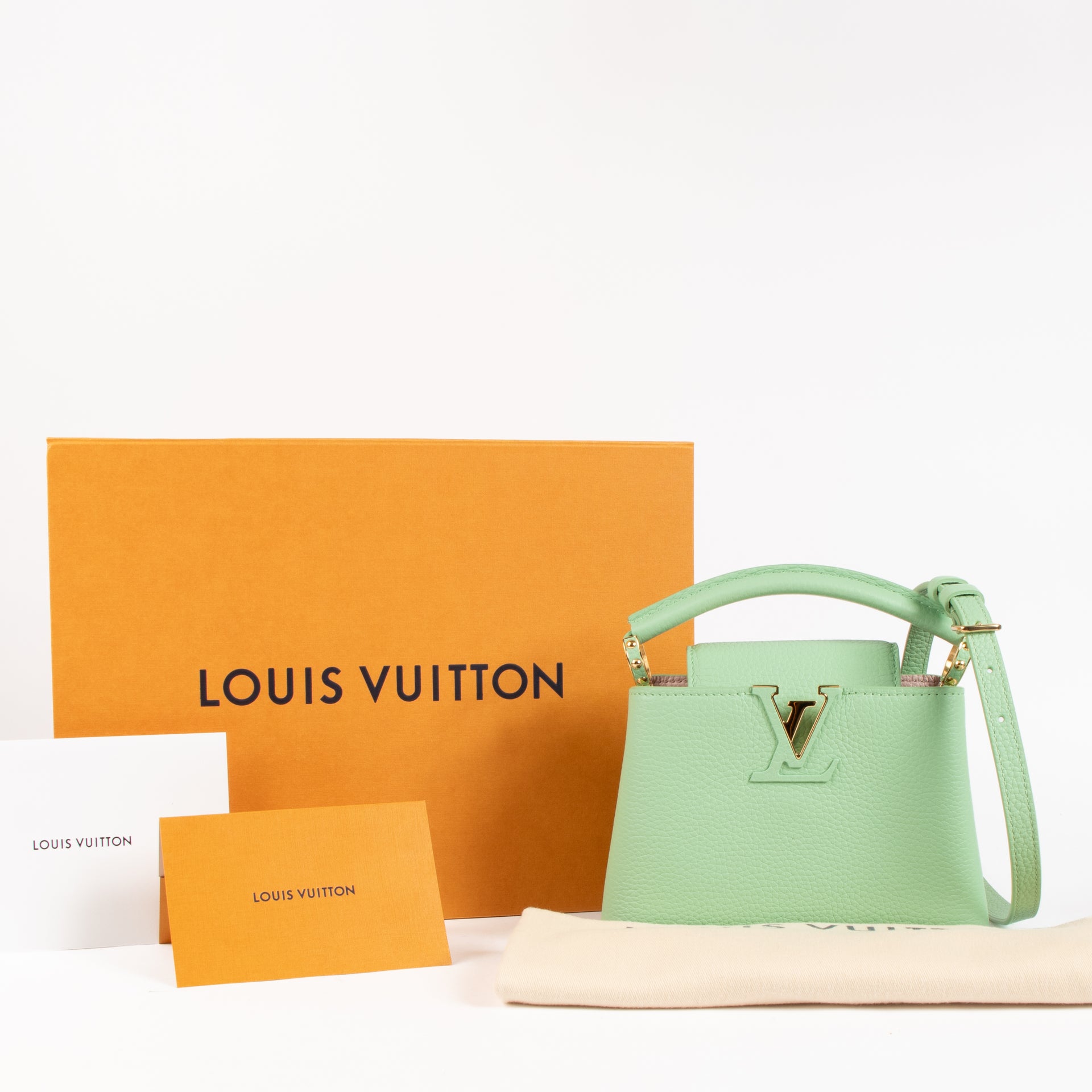 Shop the authentic Louis Vuitton Vert Pomme Taurillon Capucines Mini Bag on Labellov.com !