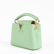 Shop the authentic Louis Vuitton Vert Pomme Taurillon Capucines Mini Bag on Labellov.com !