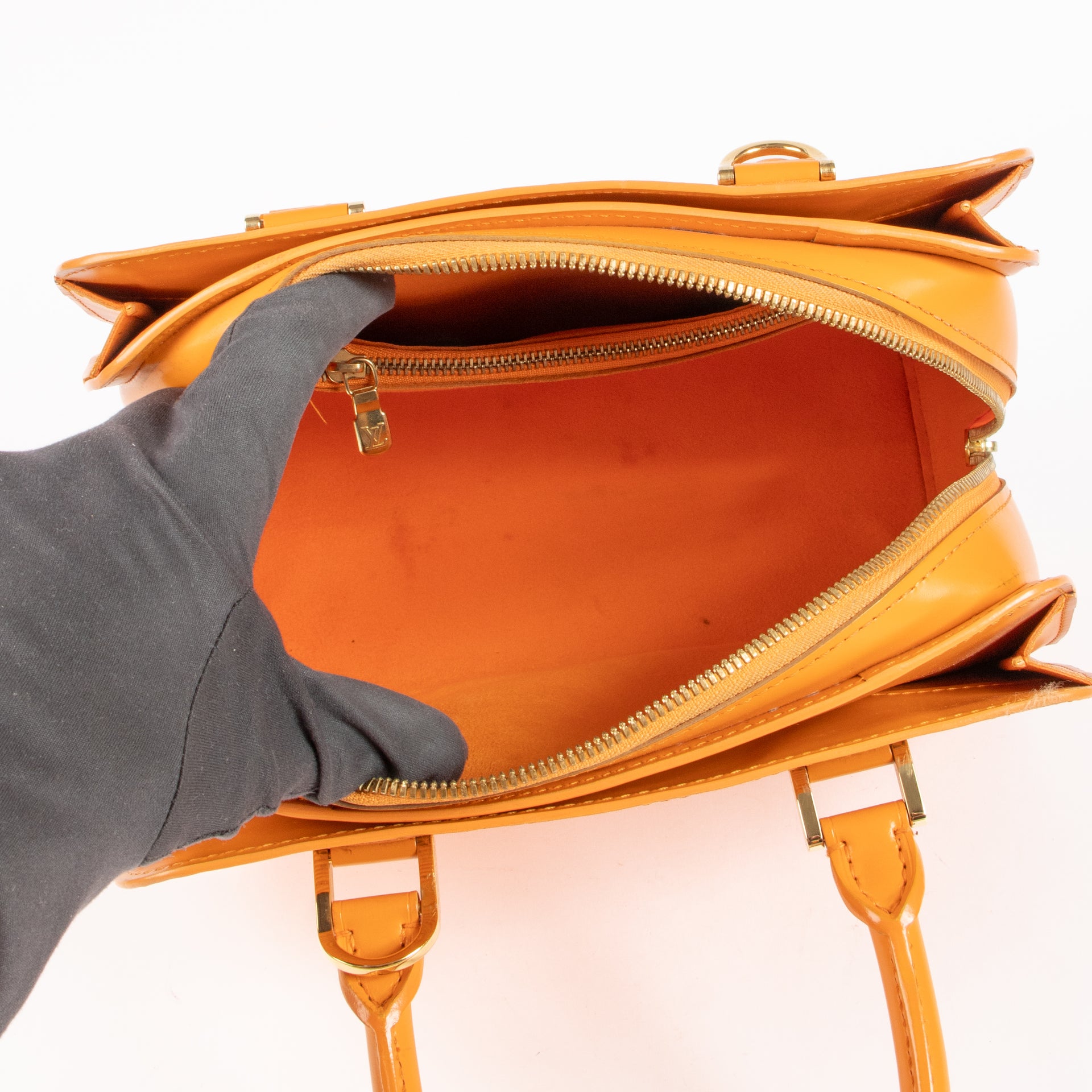 Shop the authentic Louis Vuitton Mandarin Epi Pont Neuf Bag on Labellov.com !