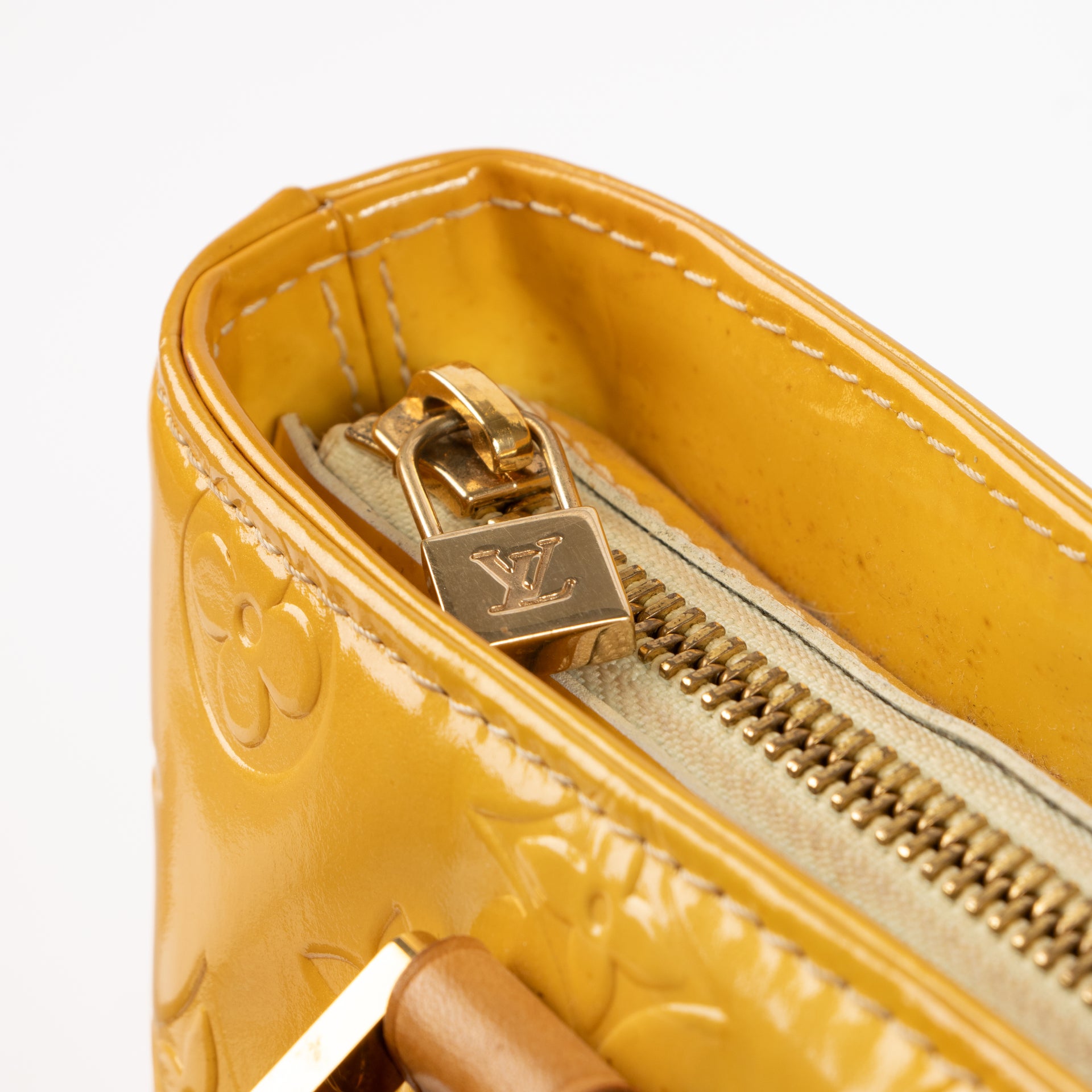 Shop the authentic Louis Vuitton Mango Monogram Vernis Houston Bag on Labellov.com !