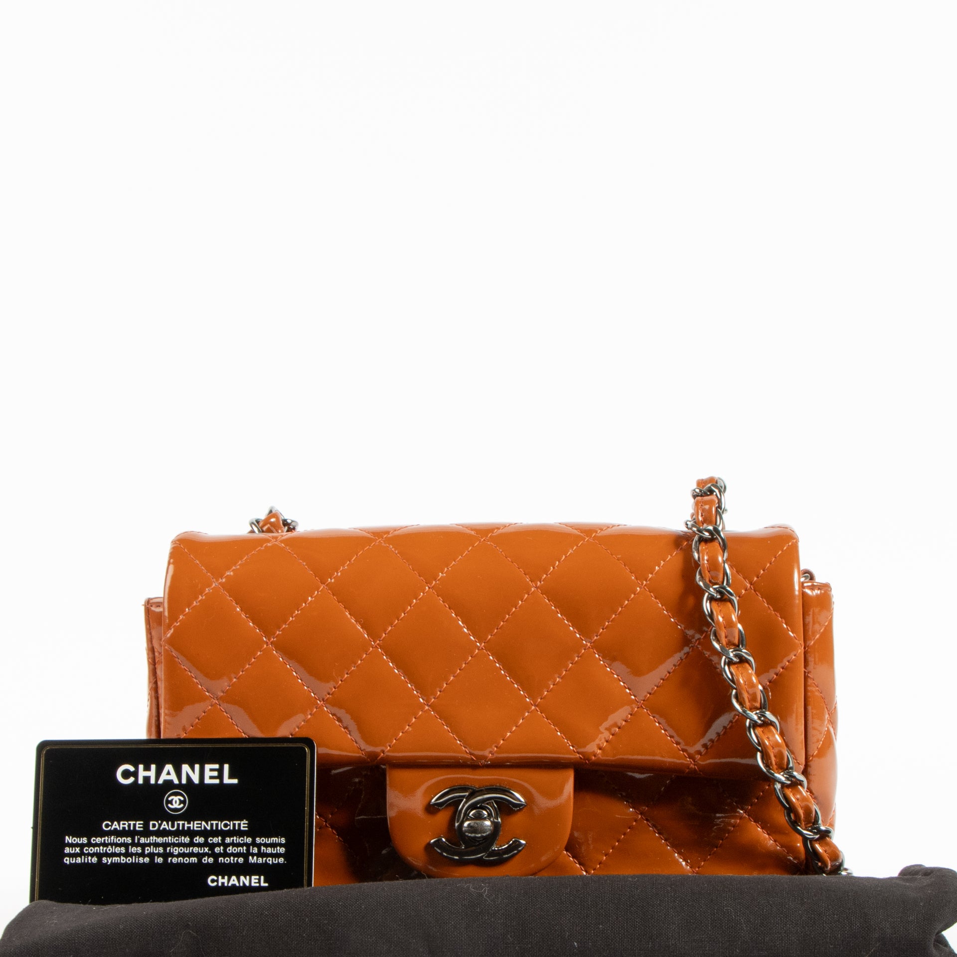 Shop this authentic Chanel Burnt Orange Patent Leather Mini Classic Bag pre-loved on Labellov.com
