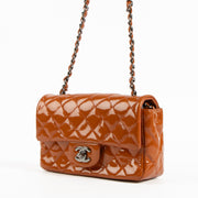 Shop this authentic Chanel Burnt Orange Patent Leather Mini Classic Bag pre-loved on Labellov.com