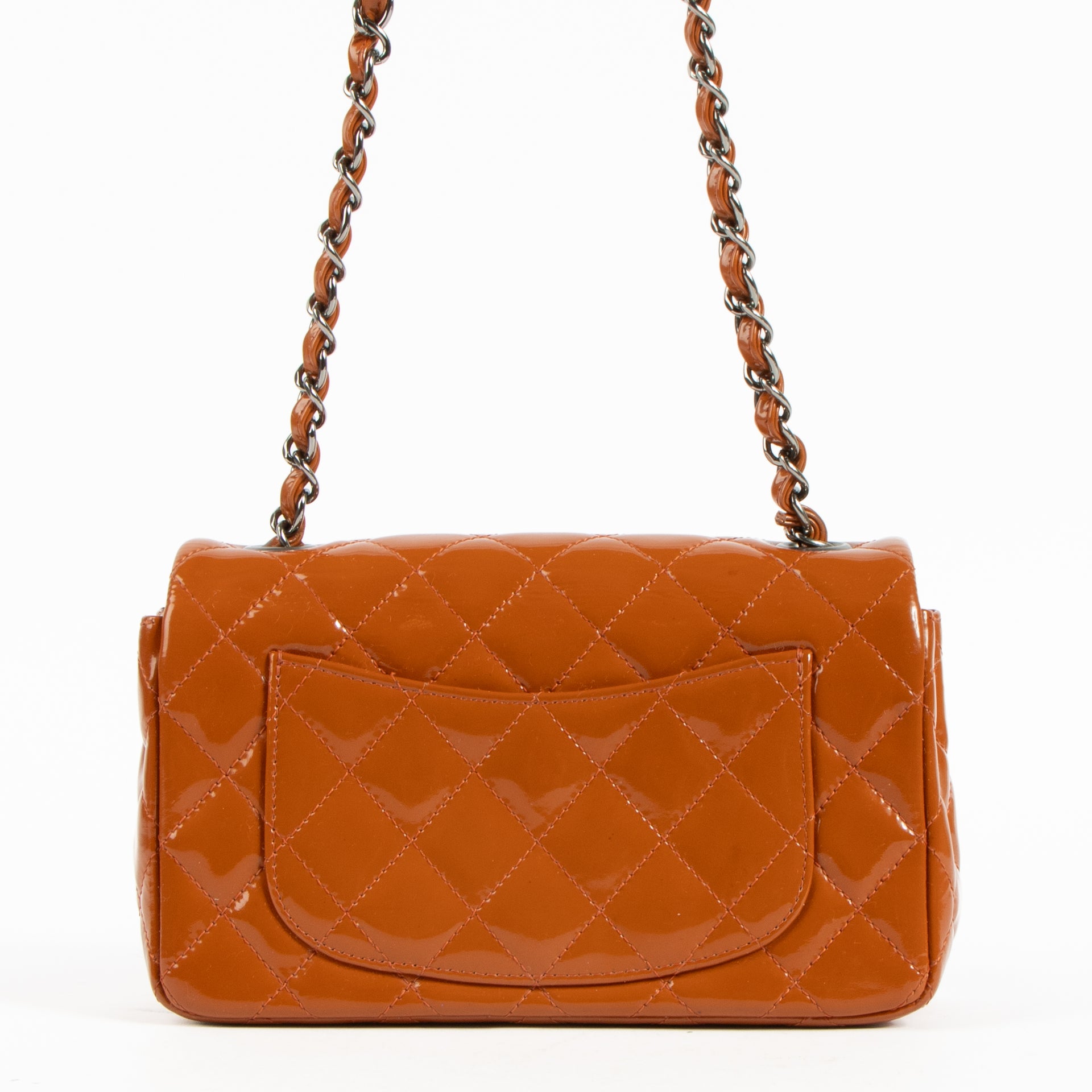 Shop this authentic Chanel Burnt Orange Patent Leather Mini Classic Bag pre-loved on Labellov.com