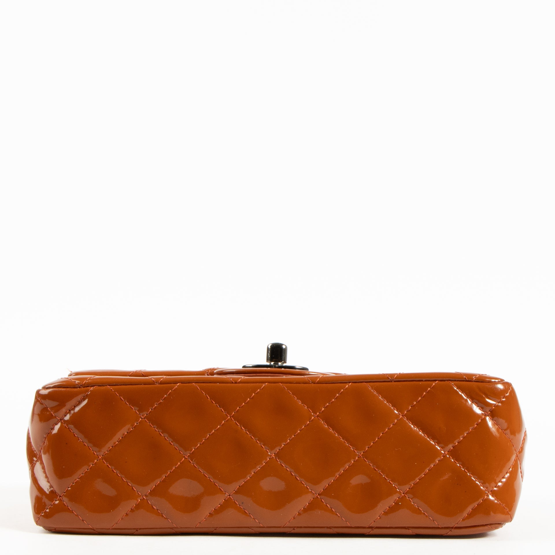 Shop this authentic Chanel Burnt Orange Patent Leather Mini Classic Bag pre-loved on Labellov.com