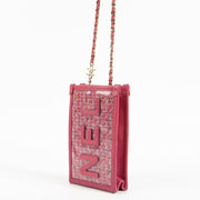 Shop authentic Chanel Pink Tweed PVC Phone Pouch with Chain on Labellov.com.