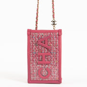 Shop authentic Chanel Pink Tweed PVC Phone Pouch with Chain on Labellov.com.