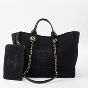 Shop this authentic Chanel Black Canvas Large Deauville Bag pre-loved on Labellov.com
