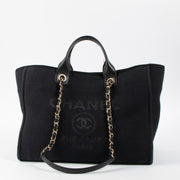 Shop this authentic Chanel Black Canvas Large Deauville Bag pre-loved on Labellov.com