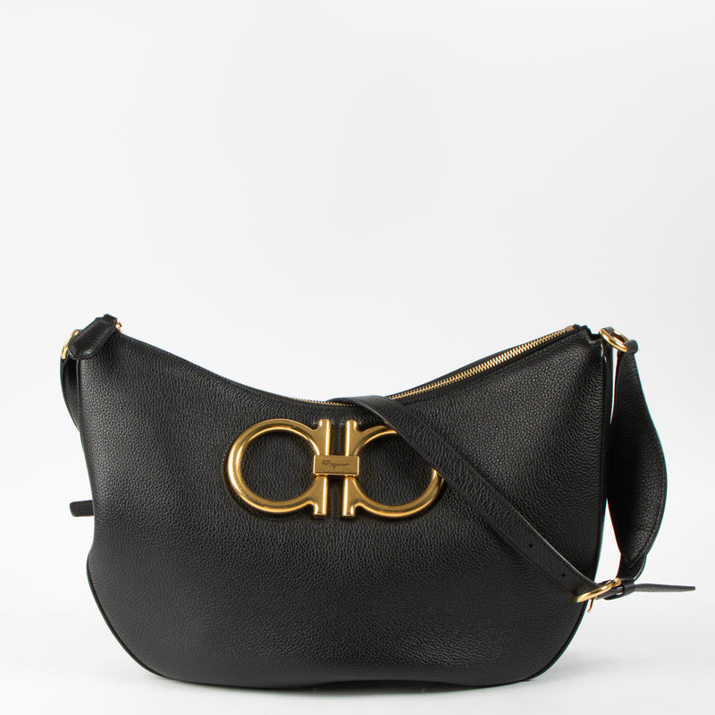 Shop this authentic Ferragamo Black Maxi Gancio Hobo Bag pre-loved on Labellov.com