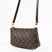 Shop the authentic Louis Vuitton Damier Ebene Navona Pochette on Labellov.com !