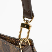 Shop the authentic Louis Vuitton Damier Ebene Navona Pochette on Labellov.com !
