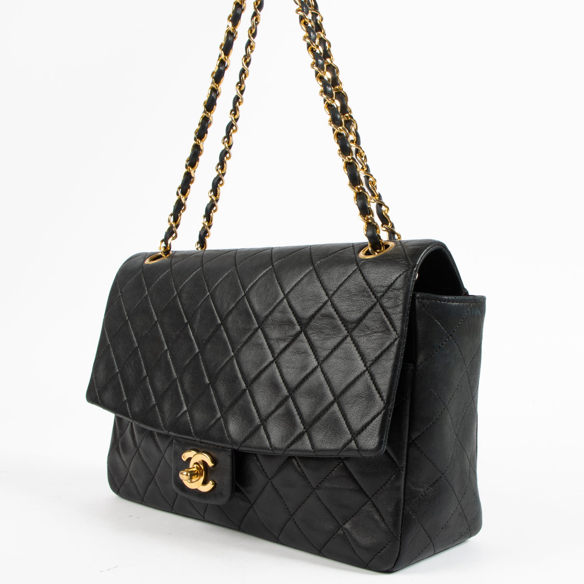 Shop the authentic Chanel Vintage Black Lambskin Flap Bag on Labellov.com !