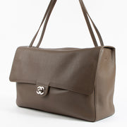 Shop the authentic Chanel Light Brown Grained Calfskin Maxi Flap Bag on Labellov.com !
