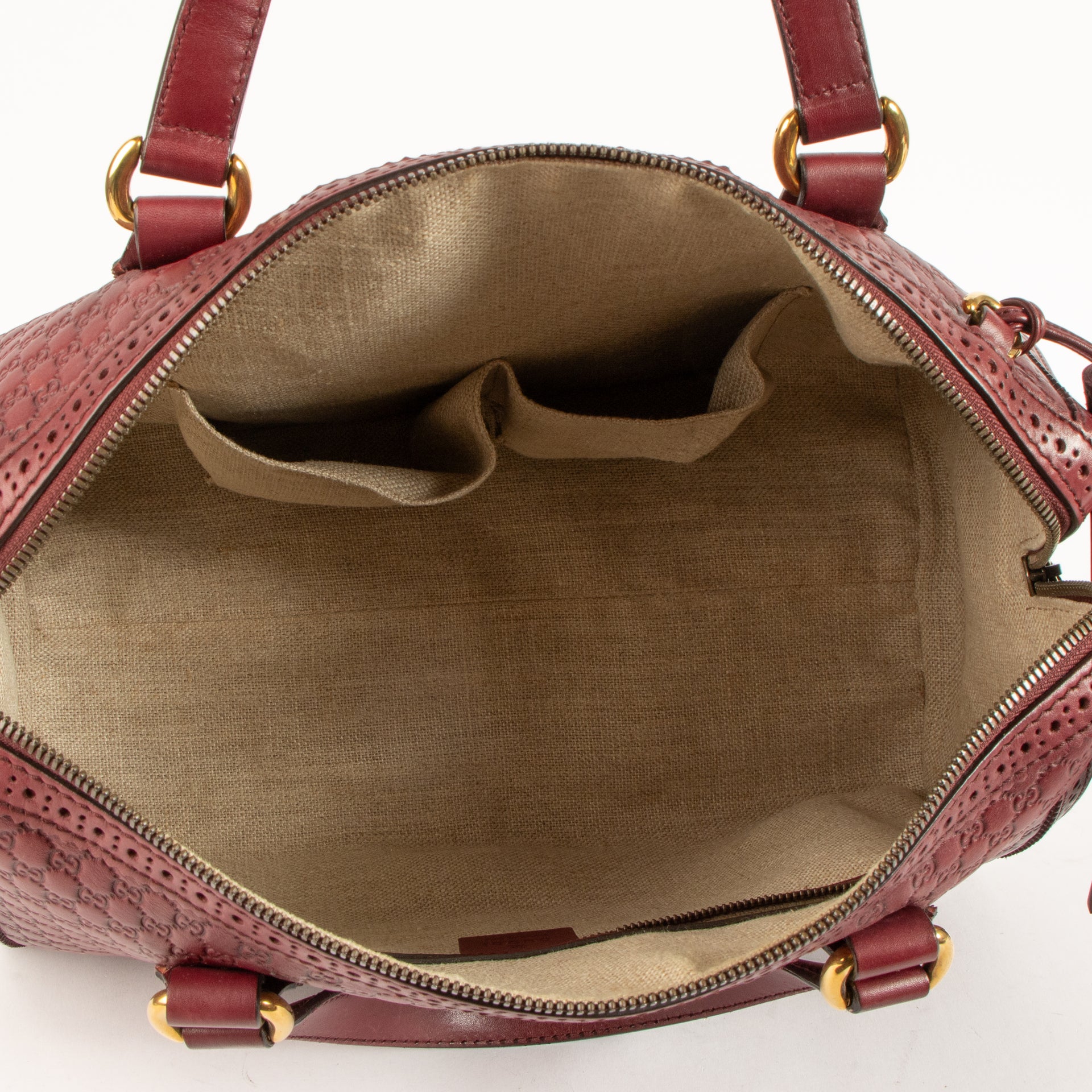 Shop this authentic Gucci Red Guilio Brogue Top handle pre-loved on Labellov.com 
