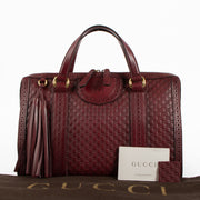 Shop this authentic Gucci Red Guilio Brogue Top handle pre-loved on Labellov.com 
