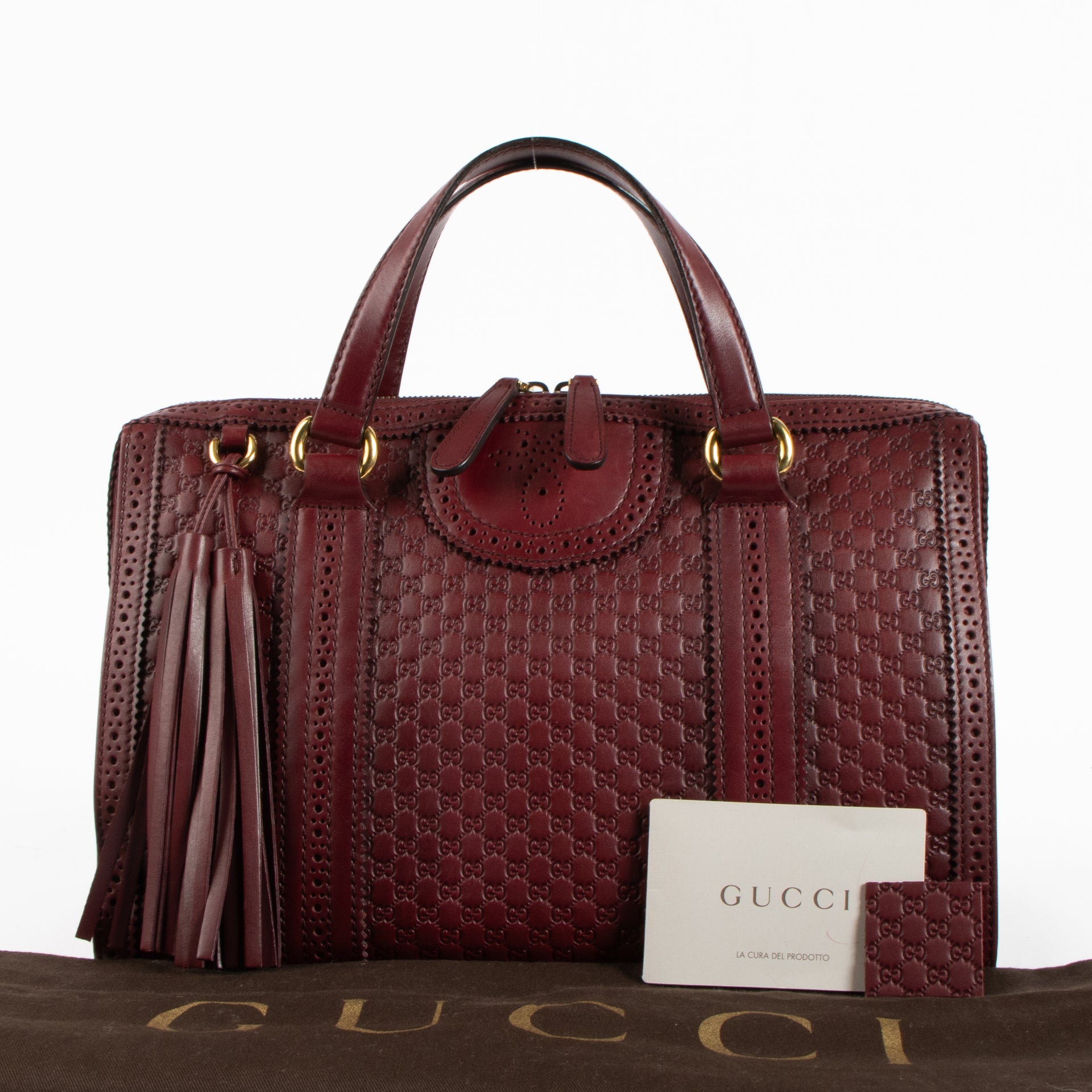 Shop this authentic Gucci Red Guilio Brogue Top handle pre-loved on Labellov.com 