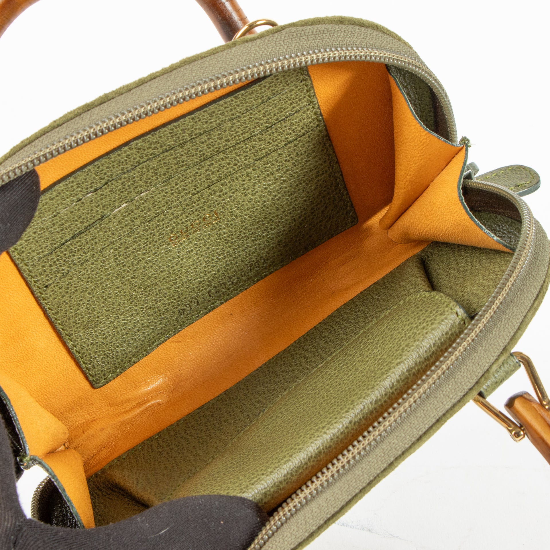 Shop this authentic Gucci Green Micro Bamboo Crossbody pre-loved on Labellov.com 