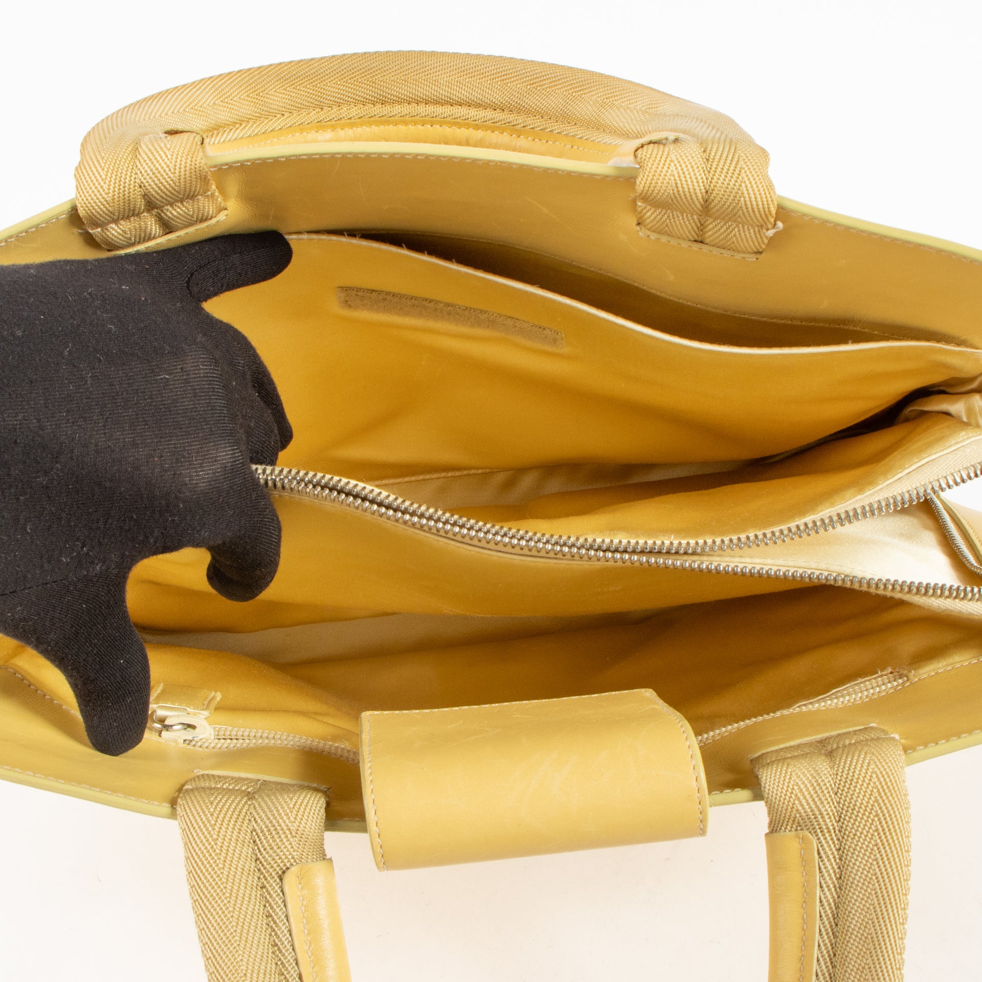 Shop this authentic Prada Vintage Butter Yellow Leather Tote Bag pre-loved on labellov.com