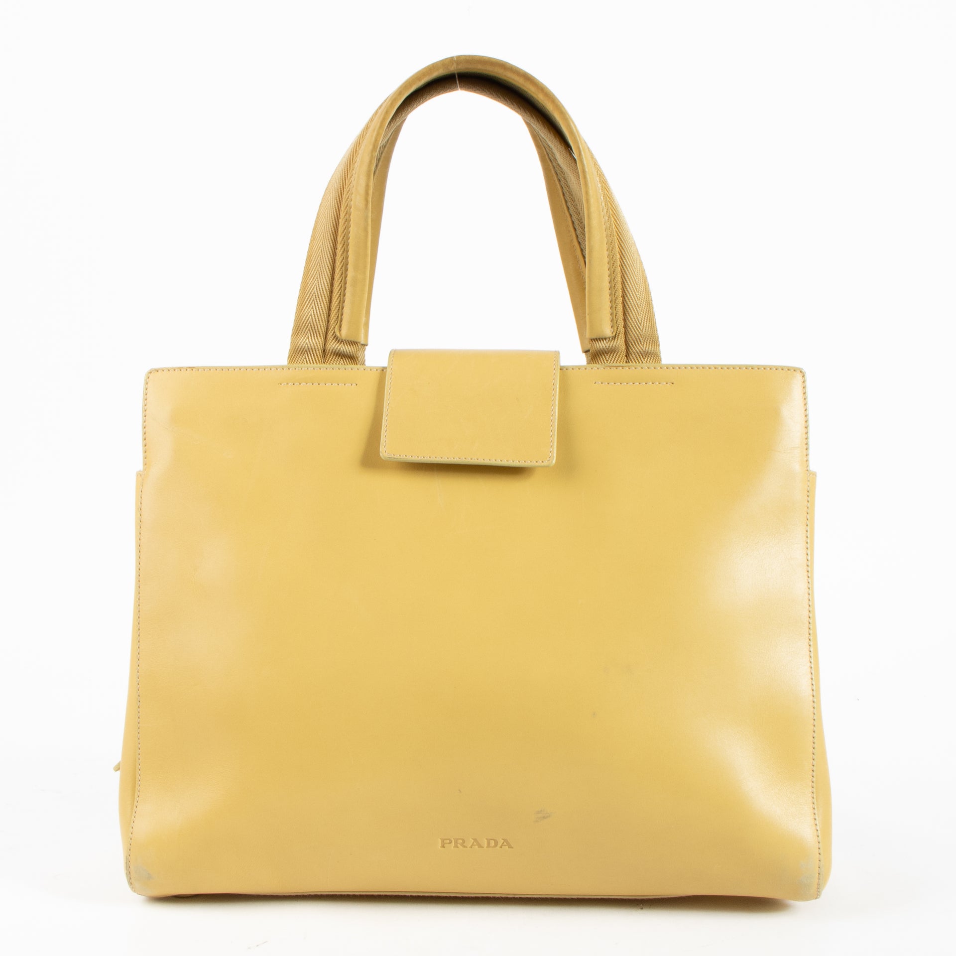 Shop this authentic Prada Vintage Butter Yellow Leather Tote Bag pre-loved on labellov.com