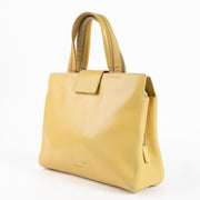 Shop this authentic Prada Vintage Butter Yellow Leather Tote Bag pre-loved on labellov.com