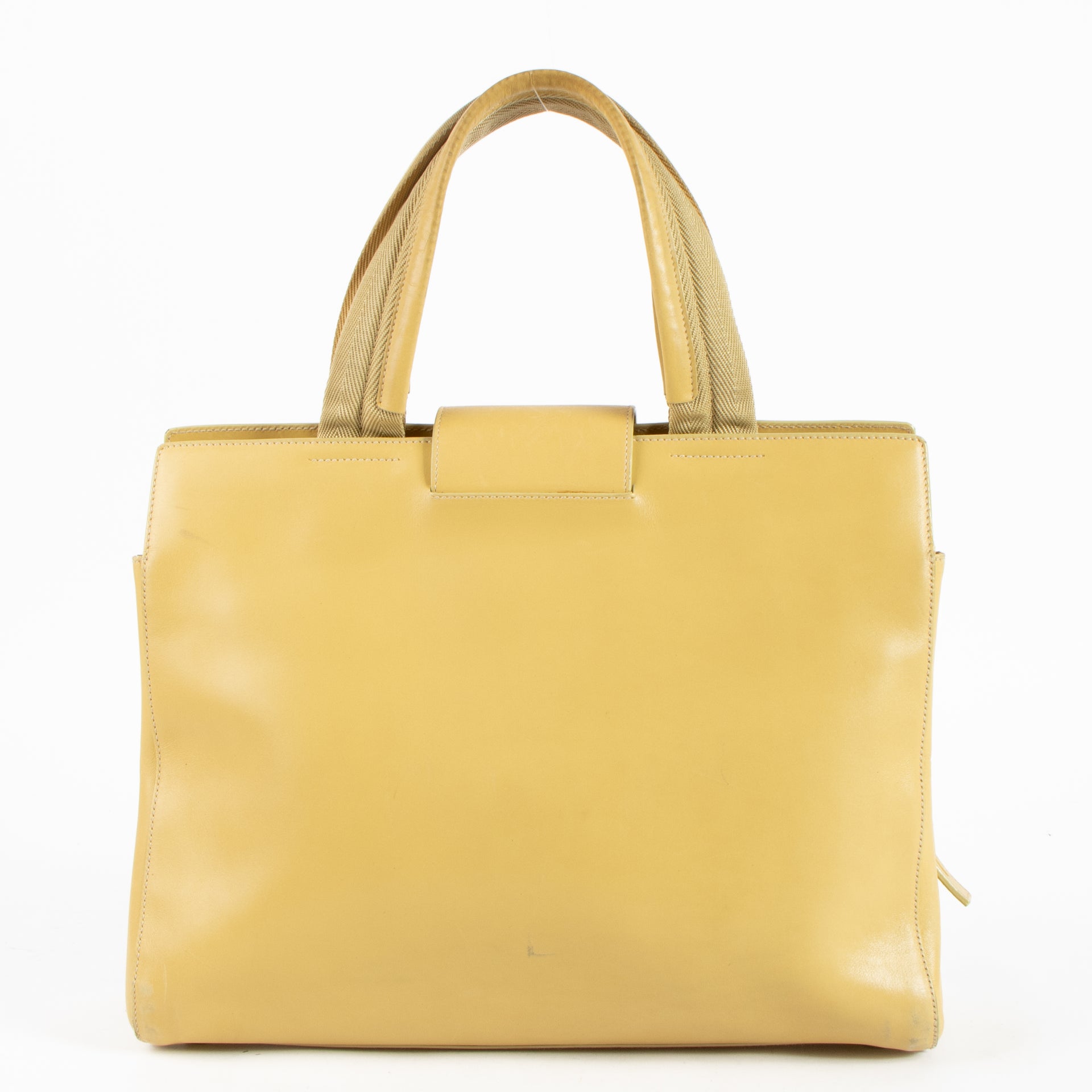 Shop this authentic Prada Vintage Butter Yellow Leather Tote Bag pre-loved on labellov.com