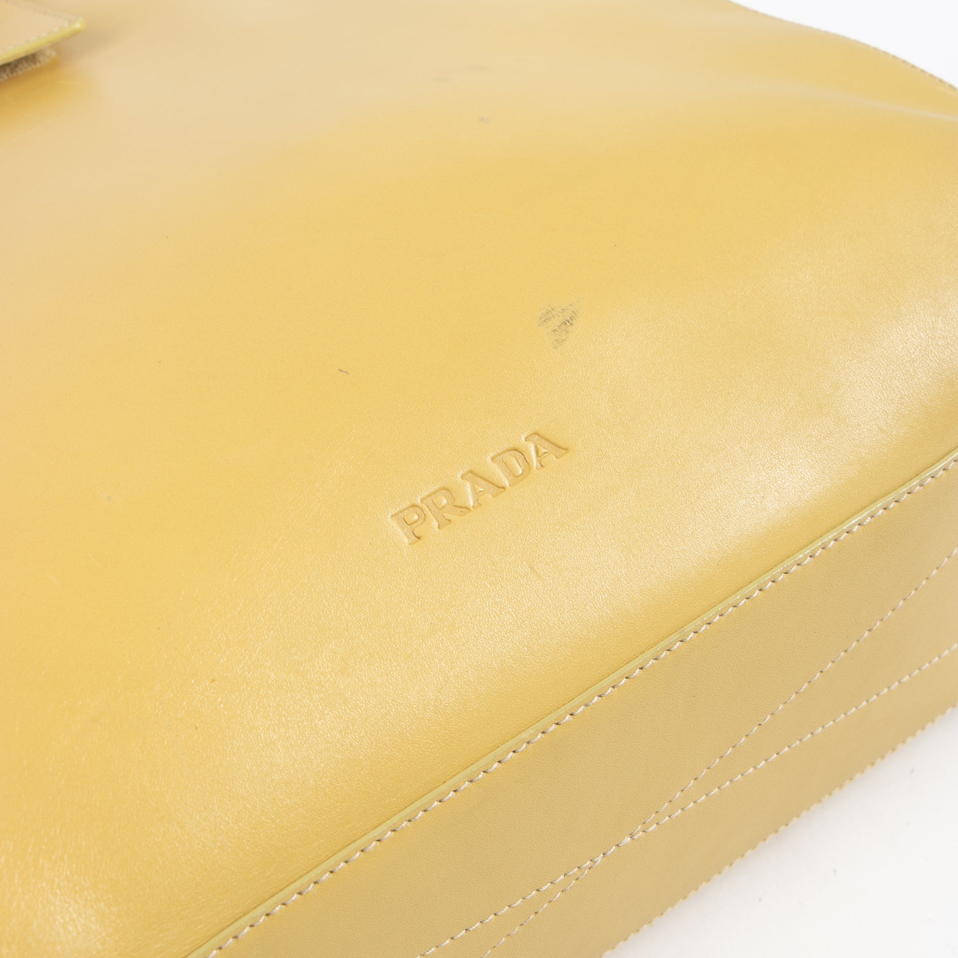 Shop this authentic Prada Vintage Butter Yellow Leather Tote Bag pre-loved on labellov.com