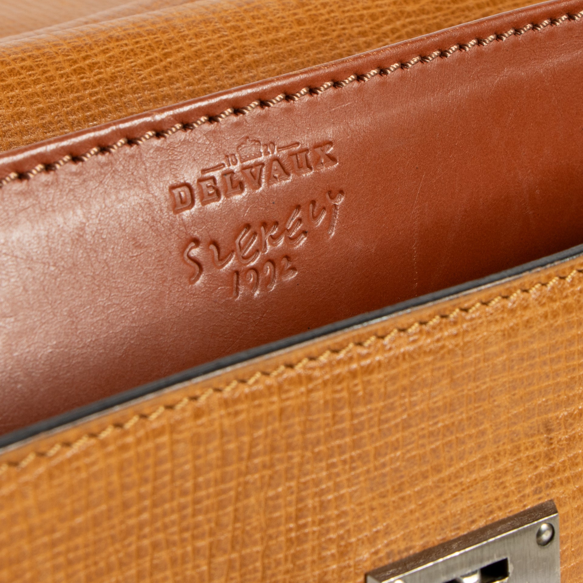 Shop this authentic Delvaux Vintage Cognac Leather Message Briefcase pre-loved on Labellov.com 
