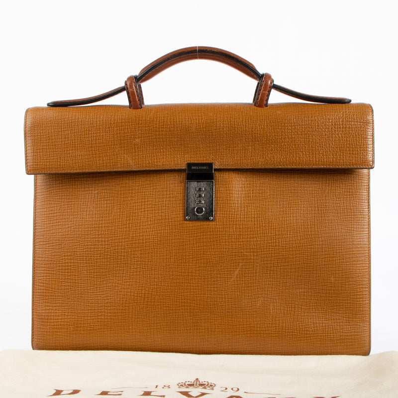 Shop this authentic Delvaux Vintage Cognac Leather Message Briefcase pre-loved on Labellov.com 