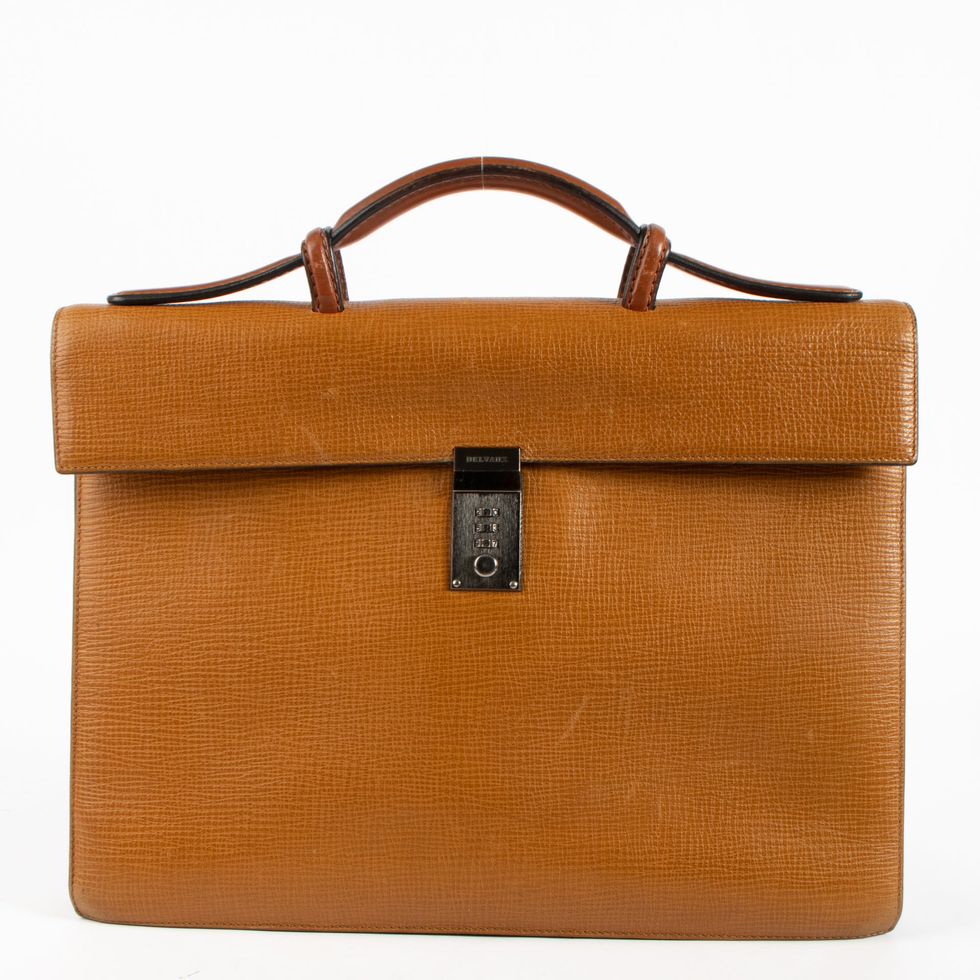 Shop this authentic Delvaux Vintage Cognac Leather Message Briefcase pre-loved on Labellov.com 