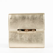 Shop this authentic Cartier Metallic Gold Leather LOVE Wallet pre-loved on Labellov.com