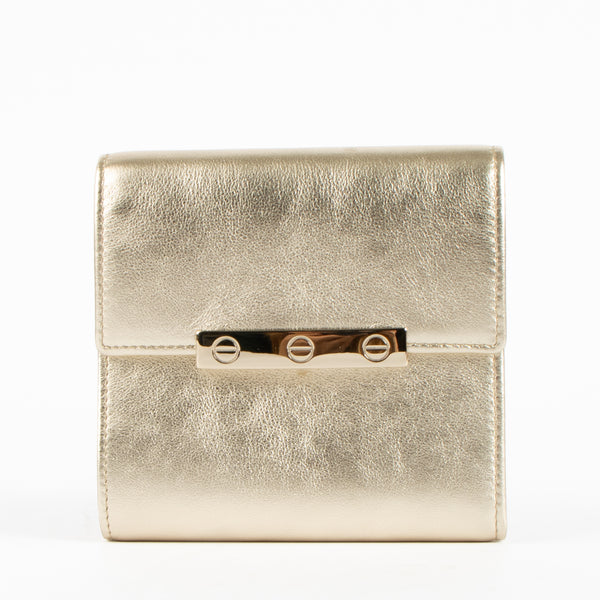 Shop this authentic Cartier Metallic Gold Leather LOVE Wallet pre-loved on Labellov.com