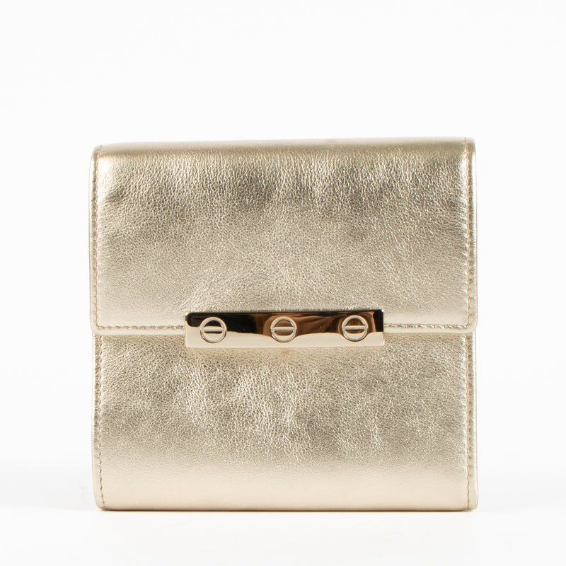 Shop this authentic Cartier Metallic Gold Leather LOVE Wallet pre-loved on Labellov.com