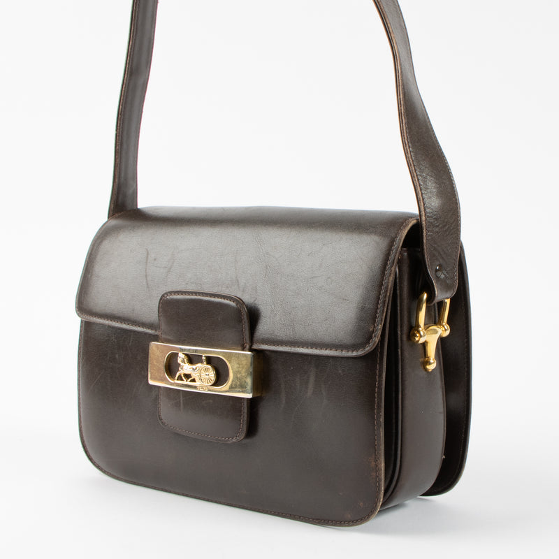Shop the 100% authentic Celine Vintage Dark Brown Shiny Calfskin Carriage Shoulder Bag second hand on Labellov.com!